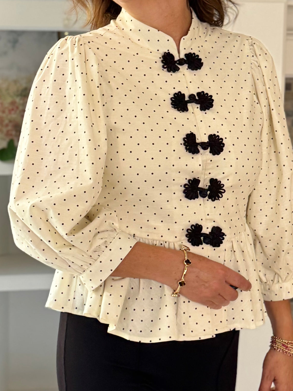A Touch of Polka Peplum Top